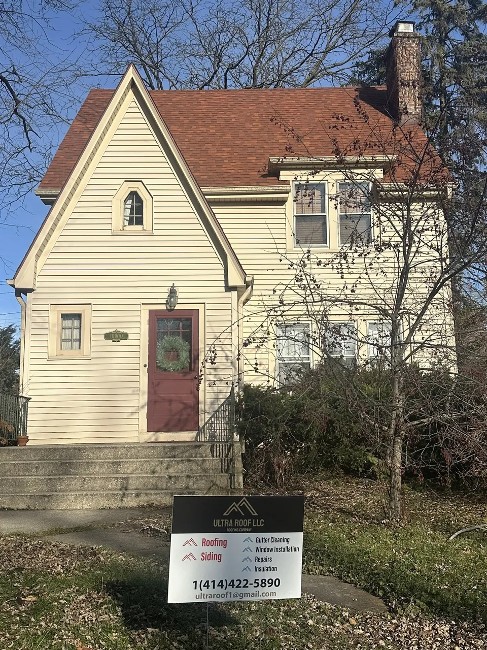 New roof replacement with the Ultra Roof LLC yard sign out front, Greendale, WI
